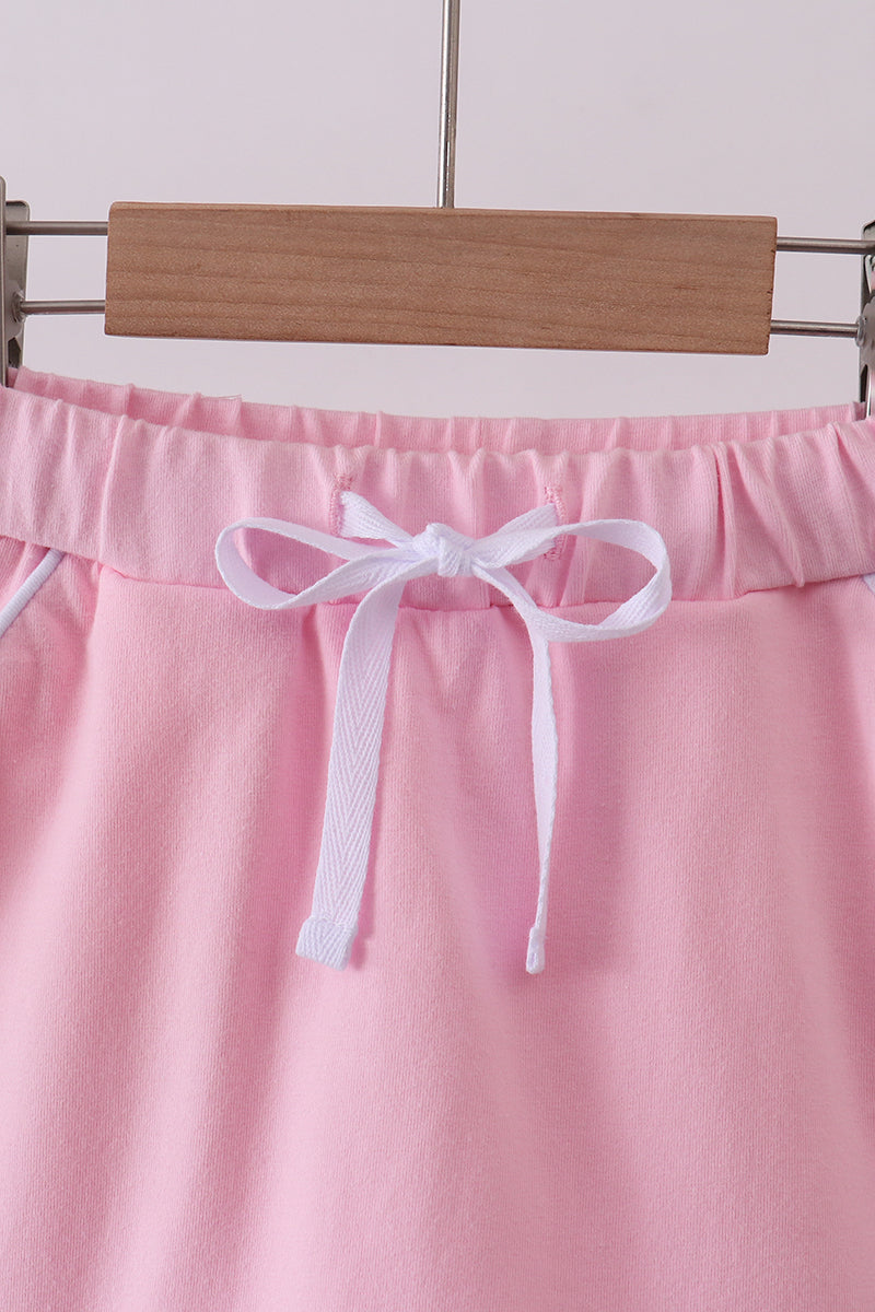 Pink scallop hem bow skort