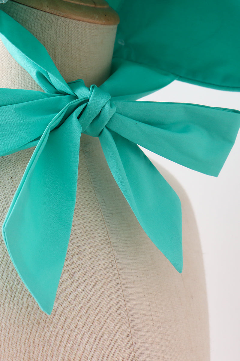 Green ruffle bow bonnet