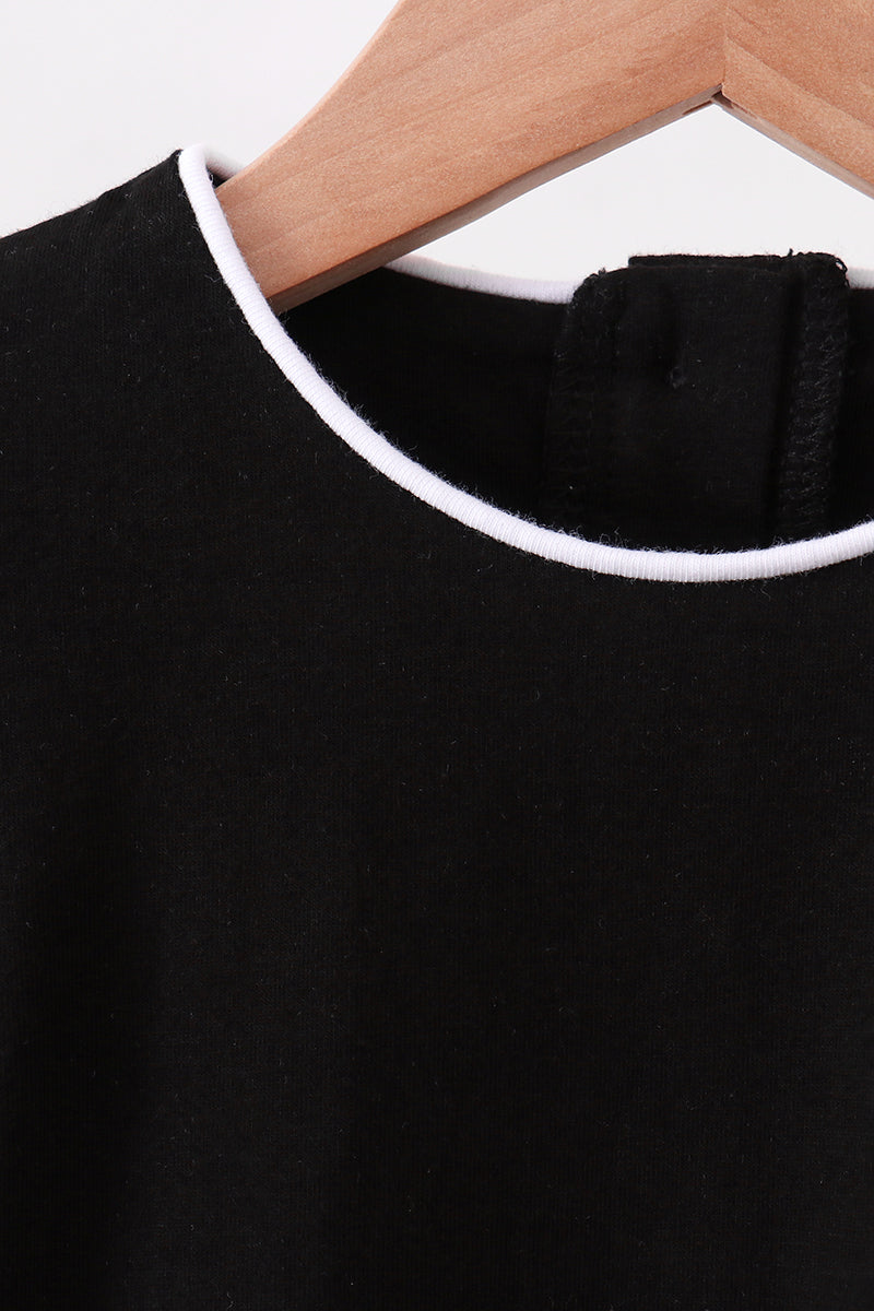 Black flutter sleeve scalloped top