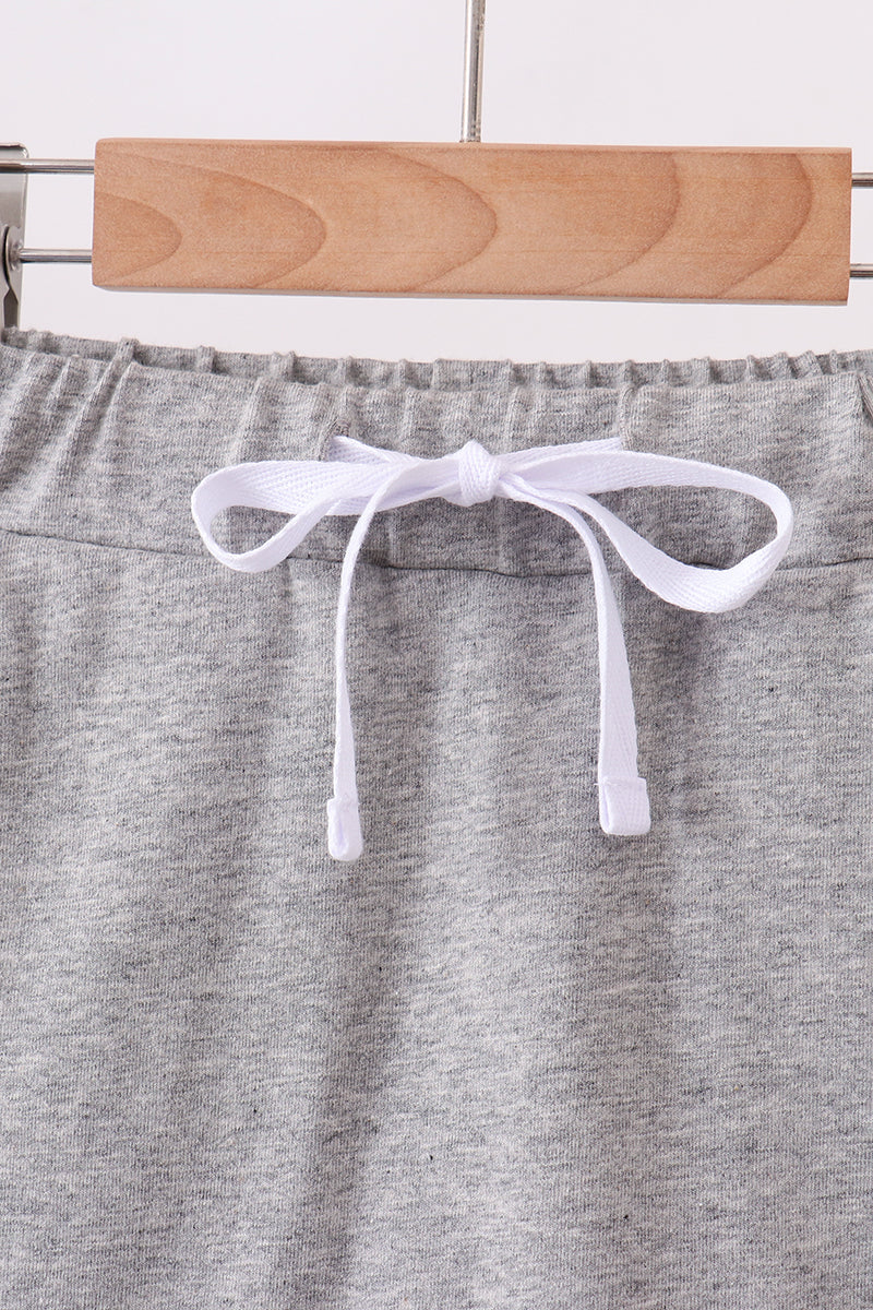 Grey scallop hem bow skort