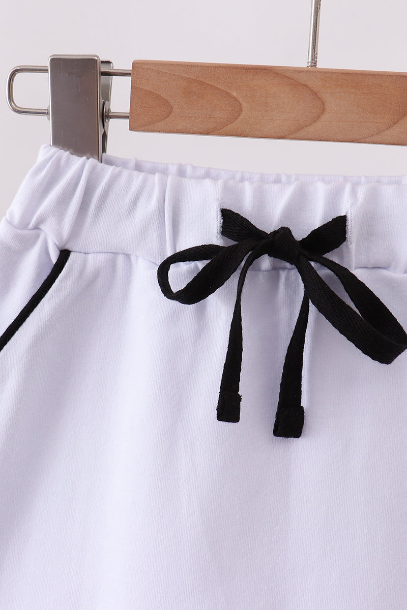 Snow white scallop hem bow skort