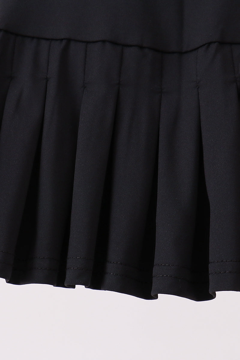 Black pleated skort