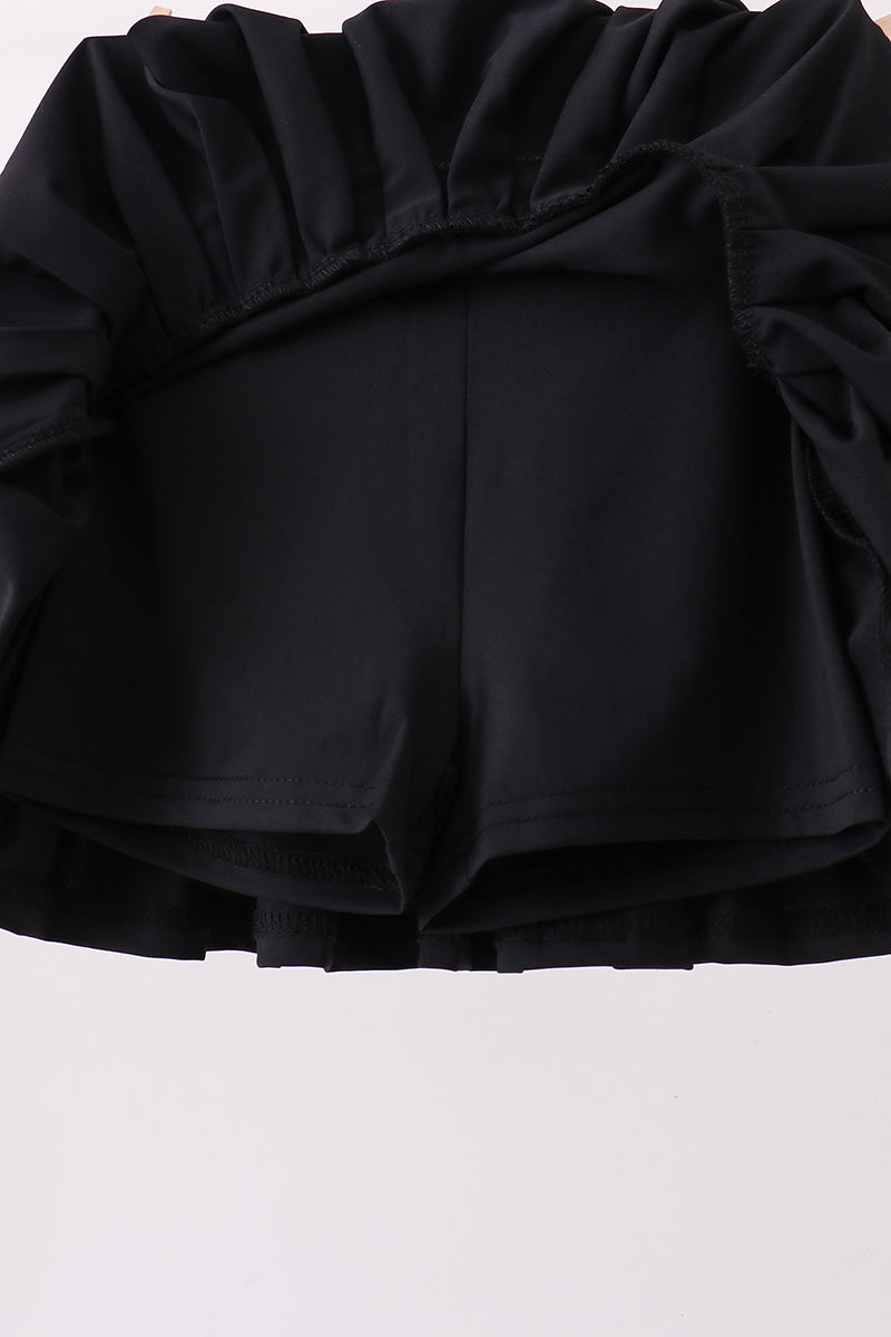 Black pleated skort