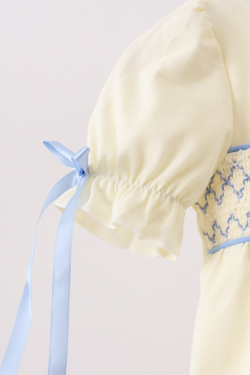 Cream smocked bubble