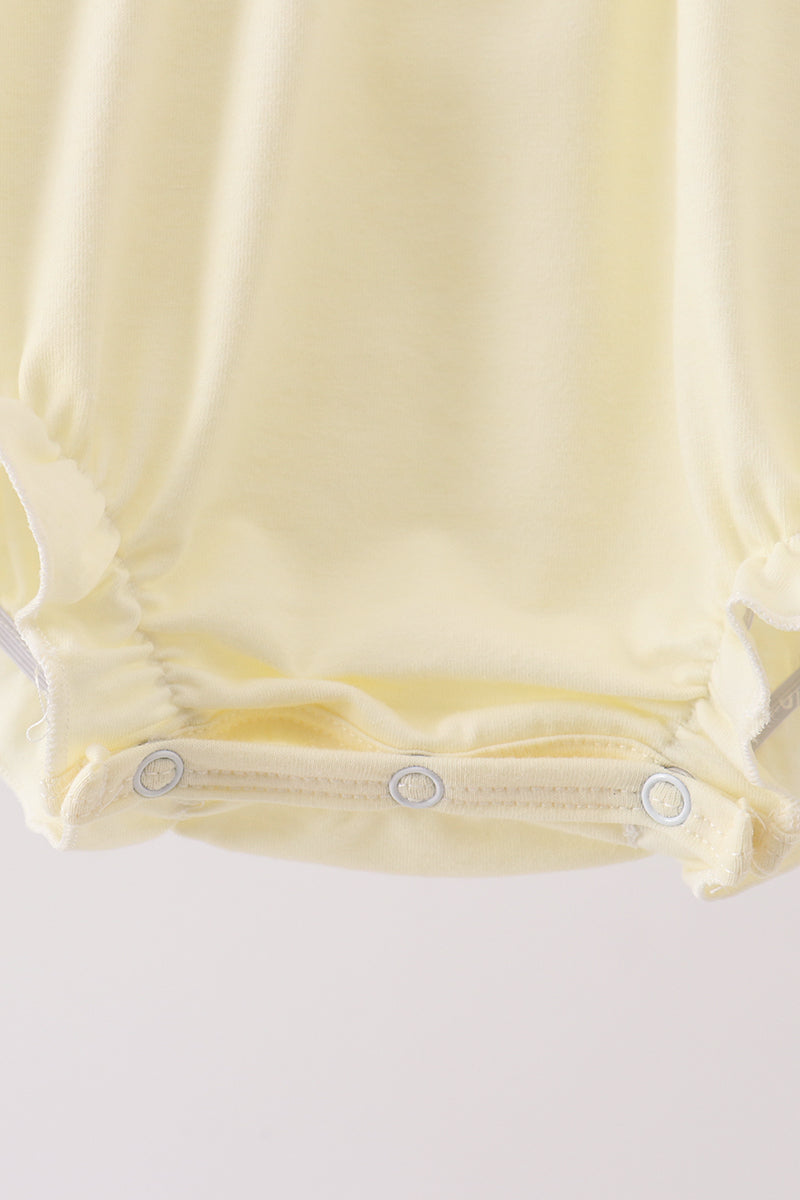 Cream smocked bubble