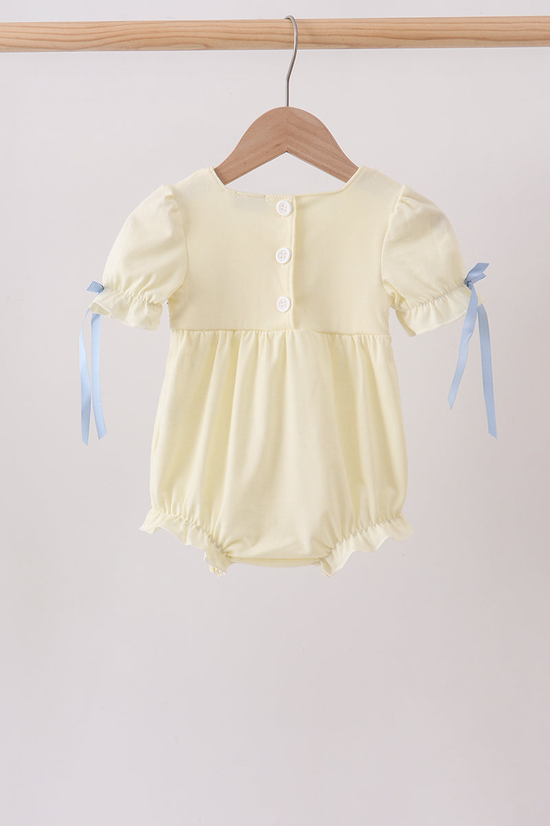 Cream smocked bubble
